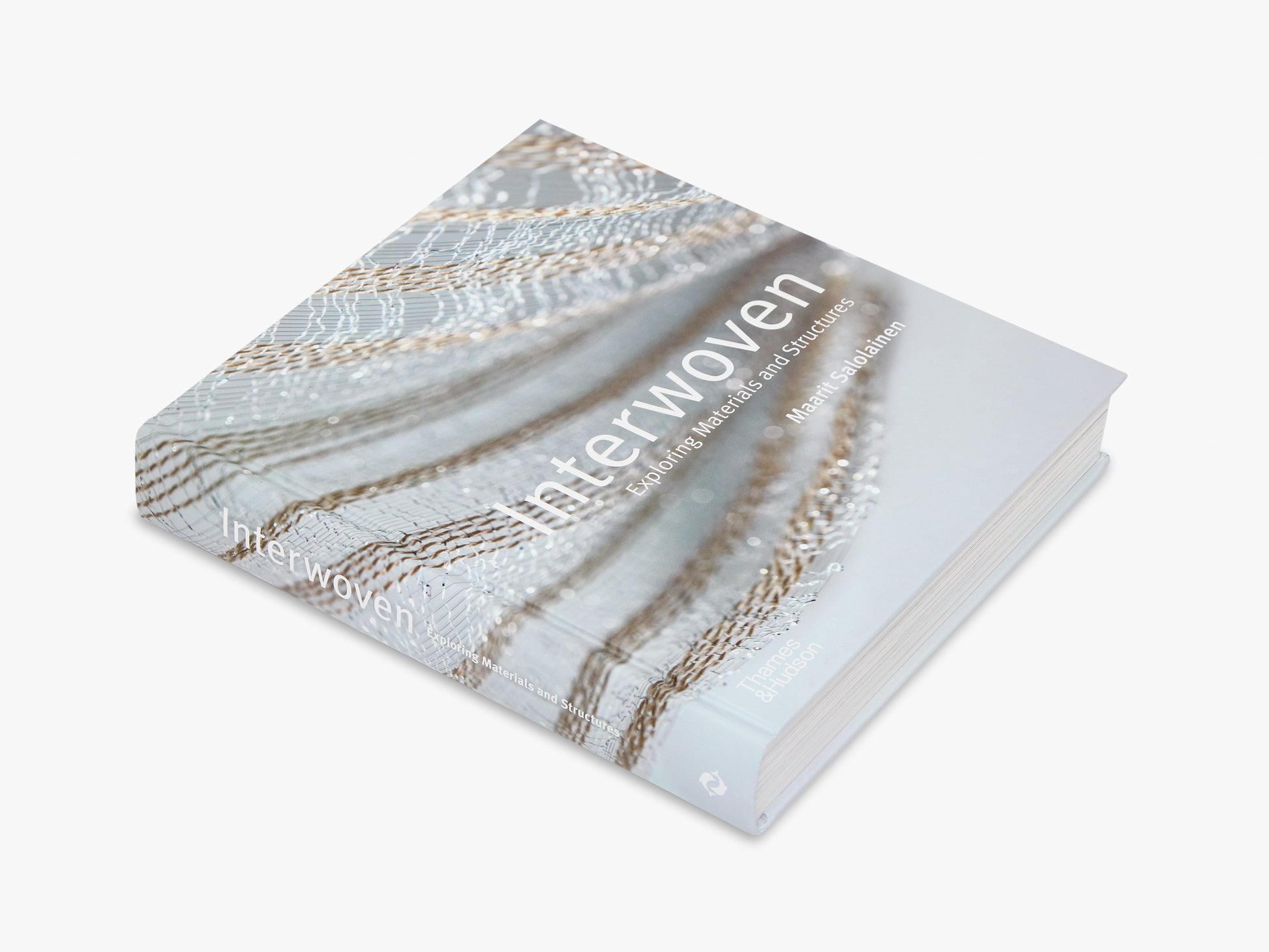 Book titled 'Interwoven' with woven pattern design on a white background