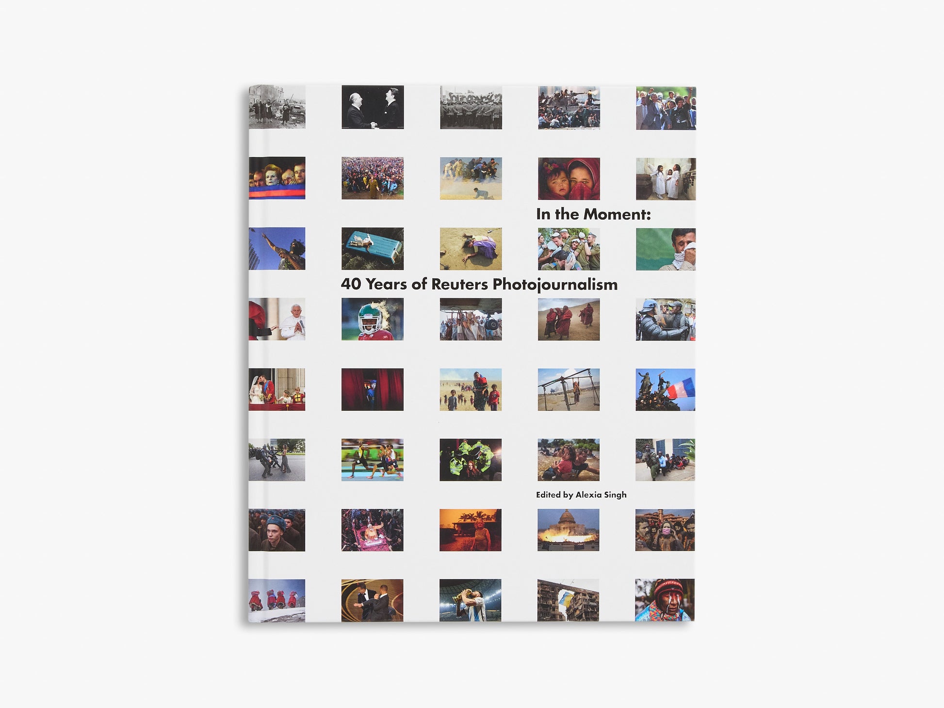Book cover with collage of photos and text 'In the Moment: 40 Years of Reuters Photojournalism' on a white background
