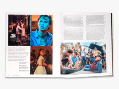 Book open to a page with images and text related to 'West Side Story'.