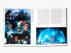Open book showing a collage of images with futuristic elements and text on a white background.