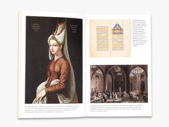 Book open to a page with a portrait of a woman, text, and an illustration of a room.